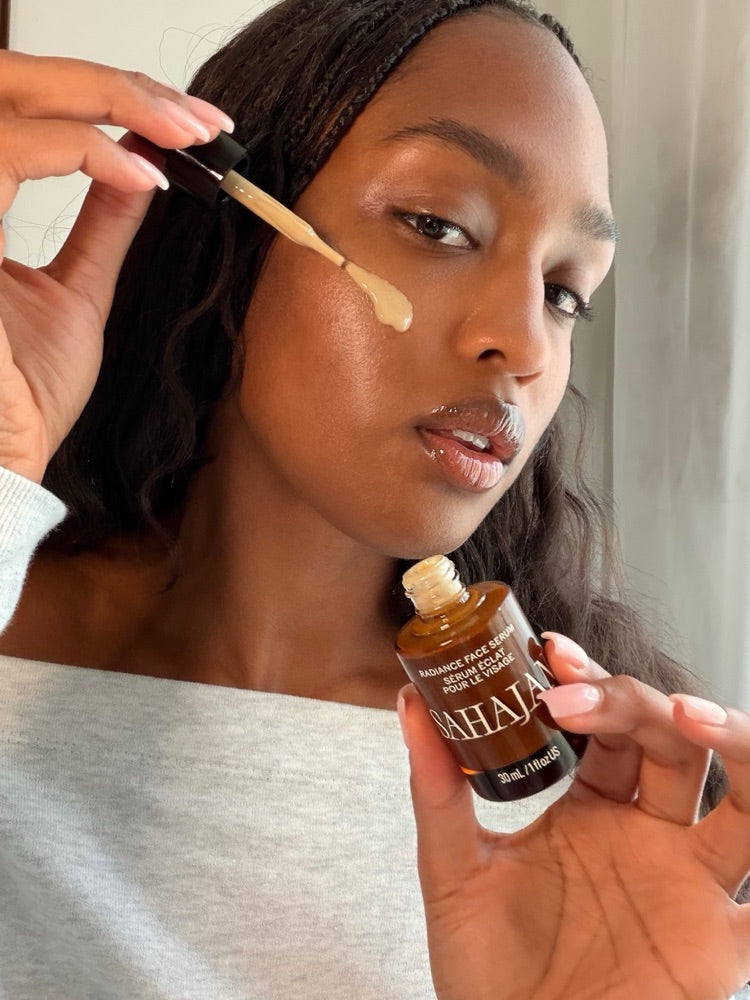 Bailey McGarrell applying Sahajan Radiance Face Serum